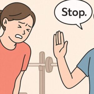 筋トレで腰痛になった女性にSTOPという女性トレーナー